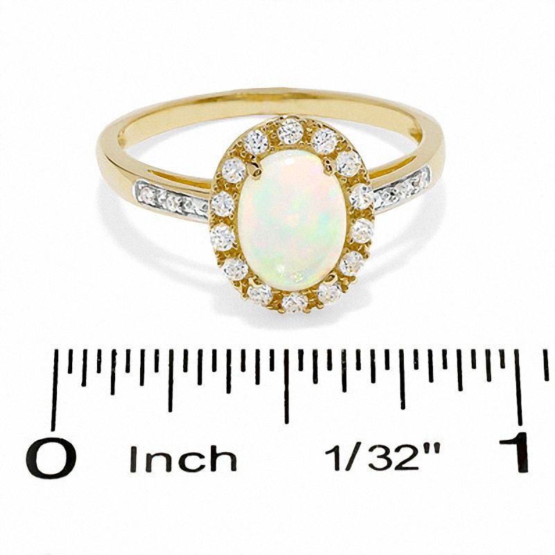 Oval Lab-Created Opal and White Sapphire Ring in 14K Gold with Diamond Accents