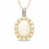 Thumbnail Image 0 of Oval Lab-Created Opal and White Sapphire Pendant in 10K Gold with Diamond Accents