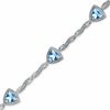 Thumbnail Image 1 of 6.0mm Trillion-Cut Blue Topaz and Diamond Accent Bracelet in Sterling Silver - 7.25"