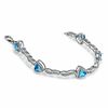 Thumbnail Image 2 of 6.0mm Trillion-Cut Blue Topaz and Diamond Accent Bracelet in Sterling Silver - 7.25"