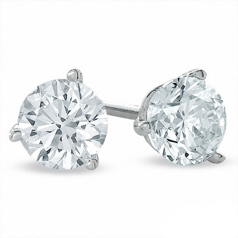 Main Image 1 of 0.70 CT. T.W. Certified Canadian Diamond Solitaire Stud Earrings in 14K White Gold (I/I2)