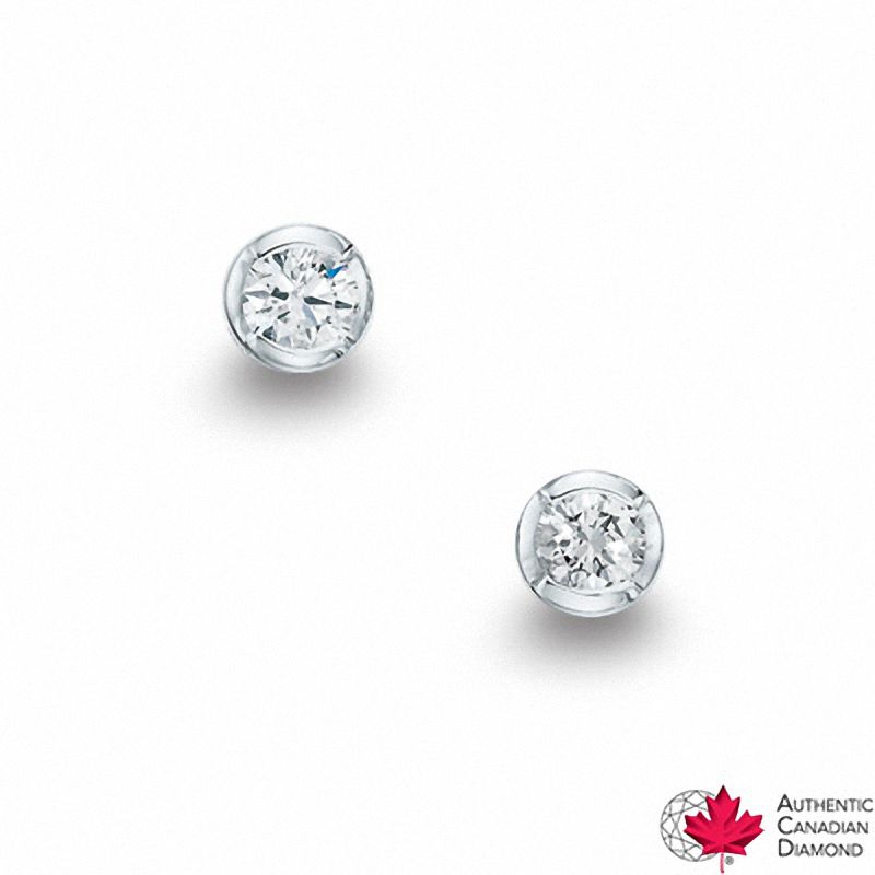 Main Image 1 of 0.20 CT. T.W. Certified Canadian Diamond Solitaire Bezel Stud Earrings in 10K White Gold (I/I2)