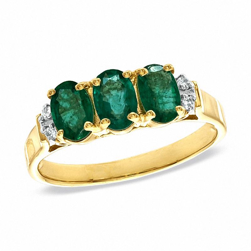 Oval Emerald and Diamond Accent Three Stone Ring in 10K Gold