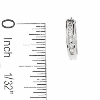 0.10 CT. T.W. Diamond Huggie Hoop Earrings in 10K White Gold