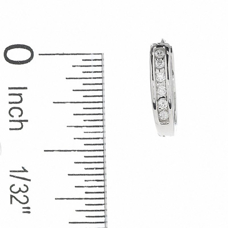 Main Image 2 of 0.10 CT. T.W. Diamond Huggie Hoop Earrings in 10K White Gold