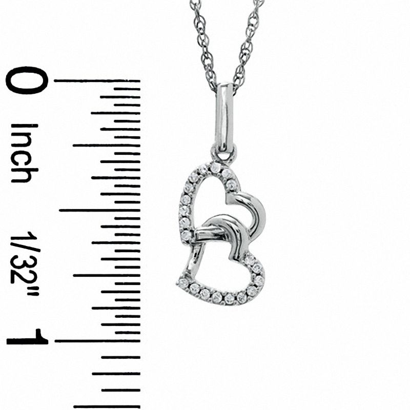 0.12 CT. T.W. Diamond Tilted Double Heart Pendant in Sterling Silver