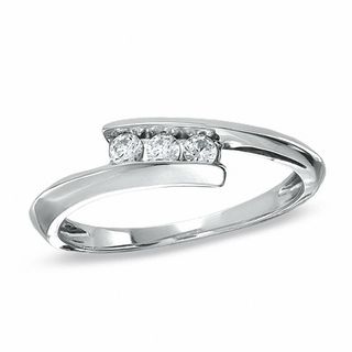 0.20 CT. T.W. Diamond Three Stone Bypass Ring in 10K White Gold