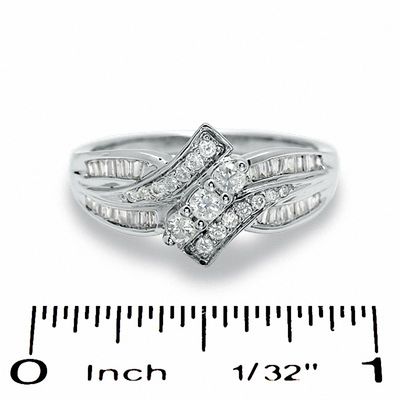 0.50 CT. T.W. Diamond Bypass Three Stone Ring in 10K Gold