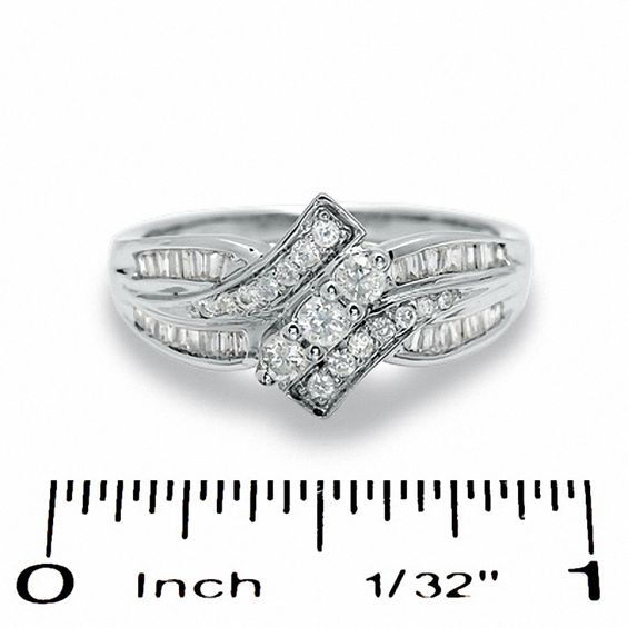 0.50 CT. T.W. Diamond Bypass Three Stone Ring in 10K Gold