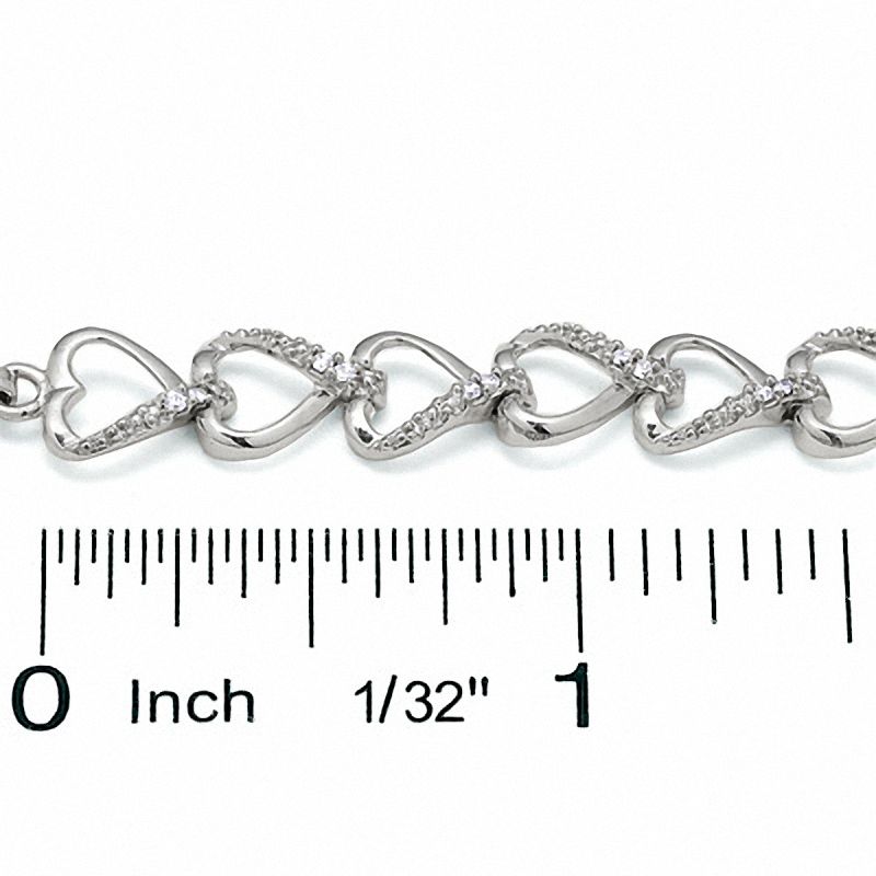 0.25 CT. T.W. Diamond Heart Line Bracelet in Sterling Silver|Peoples Jewellers