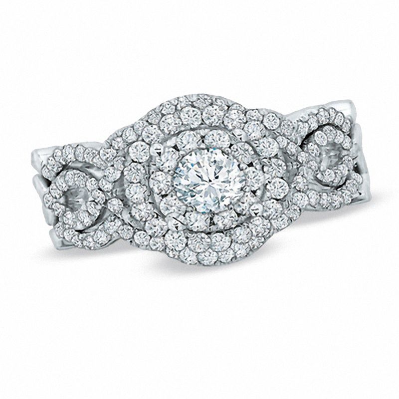 1.25 CT. T.W. Diamond Cluster Bridal Set in 14K White Gold