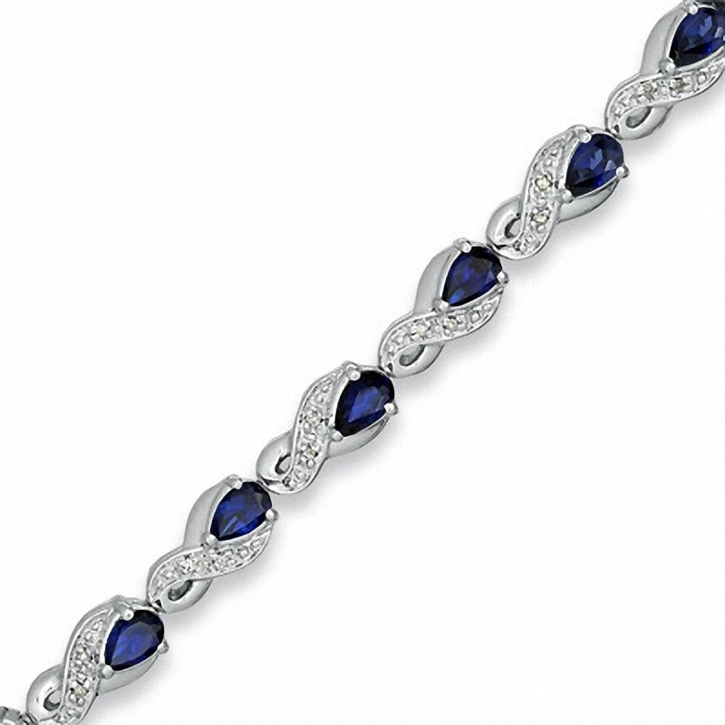 Pear-Shaped Lab-Created Blue Sapphire and 0.10 CT. T.W. Diamond Bracelet in Sterling Silver
