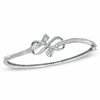 0.33 CT. T.W. Diamond Infinity Knot Bangle in Sterling Silver