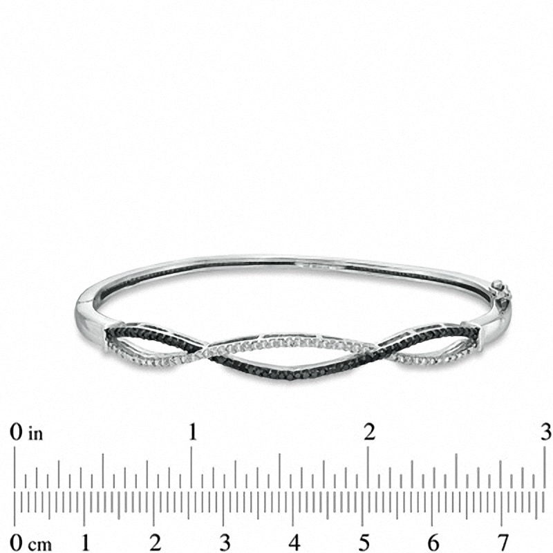 Main Image 2 of 0.50 CT. T.W. Enhanced Black and White Diamond Criss-Cross Bangle in Sterling Silver