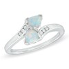 Thumbnail Image 0 of 5.0mm Trillion-Cut Lab-Created Opal and Diamond Accent Bypass Ring in Sterling Silver