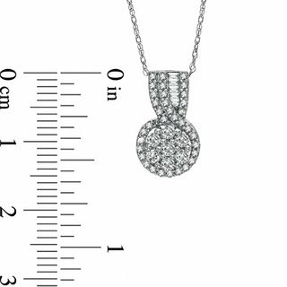 0.49 CT. T.W. Diamond Cluster Swirl Pendant in 10K White Gold