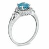 Thumbnail Image 1 of Blue Topaz and 0.28 CT. T.W. Diamond Frame Ring in 10K White Gold