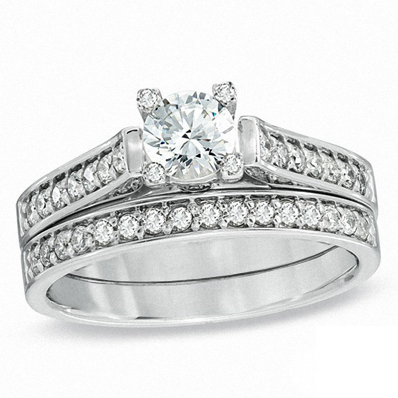 0.94 CT. T.W. Certified Canadian Diamond Bridal Set in 14K White Gold (I/I1)