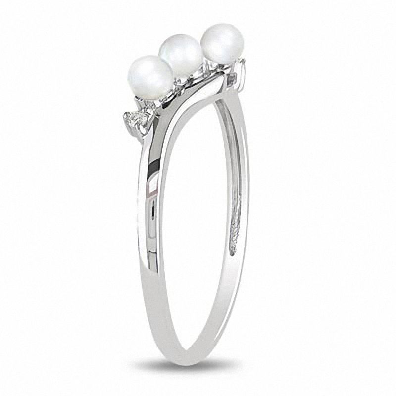 3.0 - 3.5mm Cultured Freshwater Pearl and Diamond Accent Three Stone Slant Ring in 10K White Gold