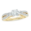 Thumbnail Image 0 of 0.65 CT. T.W. Diamond Three Stone Split Shank Engagement Ring in 14K Gold