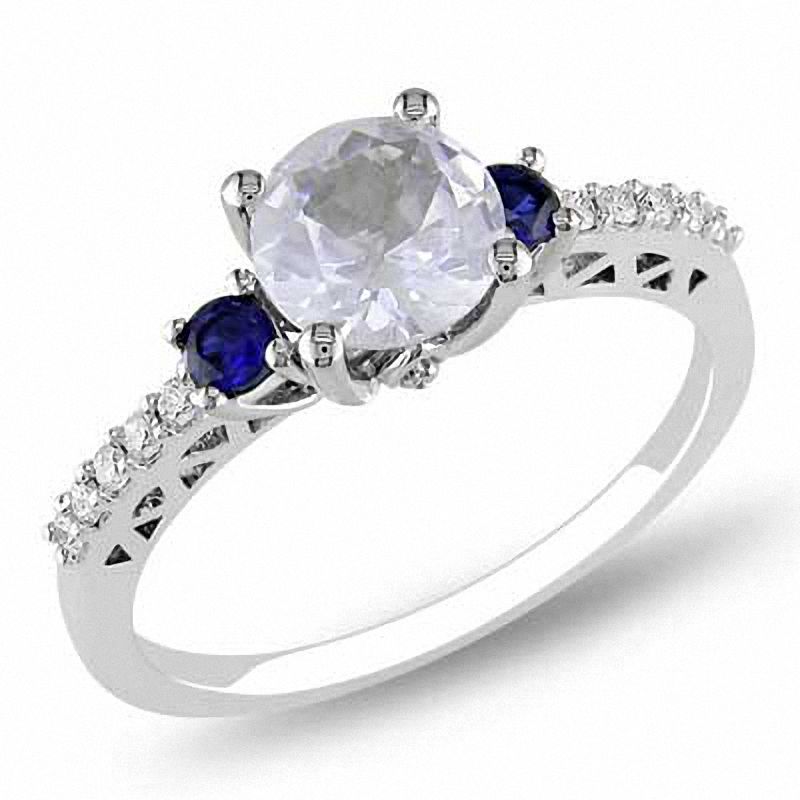 Lab-Created White and Blue Sapphire Three Stone Ring with 0.10 CT. T.W Diamonds in 10K White Gold|Peoples Jewellers