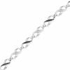 Thumbnail Image 0 of 0.10 CT. T.W. Enhanced Black and White Diamond Infinity Loop Bracelet in Sterling Silver