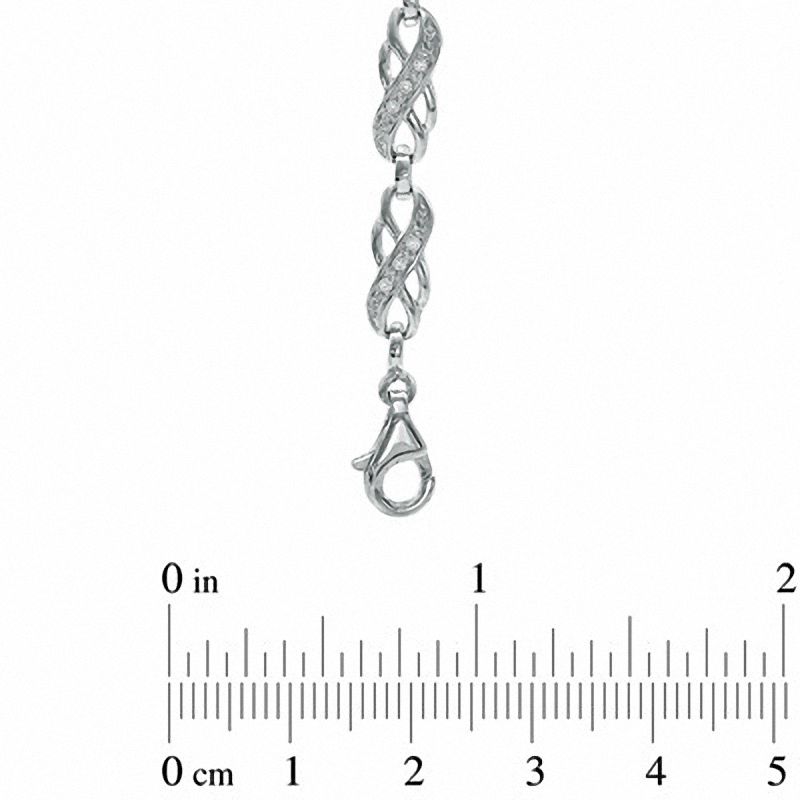 0.10 CT. T.W. Diamond Swirl Fashion Bracelet in Sterling Silver