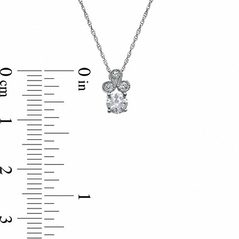 0.38 CT. T.W. Diamond Trinity Pendant in 10K White Gold