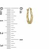 Thumbnail Image 1 of Child's Faceted Hoop Earrings in 14K Gold