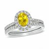 Thumbnail Image 1 of Certified Oval Yellow Sapphire and 0.46 CT. T.W. Diamond Bridal Set in 14K White Gold