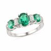 Oval Lab-Created Emerald and Diamond Accent Ring in Sterling Silver