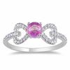 Thumbnail Image 0 of Pink Sapphire and 0.19 CT. T.W. Diamond Bow Ring in 10K White Gold