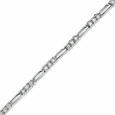 0.24 CT. T.W. Diamond Three Stone Station Bracelet in 10K White Gold