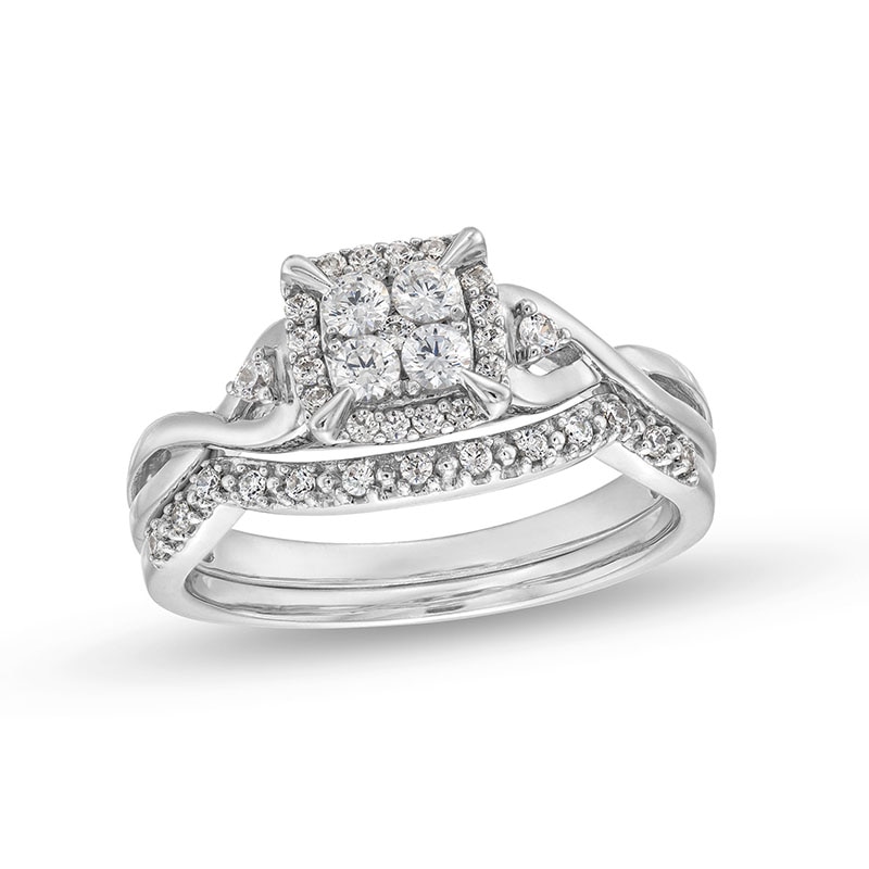 0.33 CT. T.W. Quad Diamond Twist Shank Bridal Set 10K White Gold