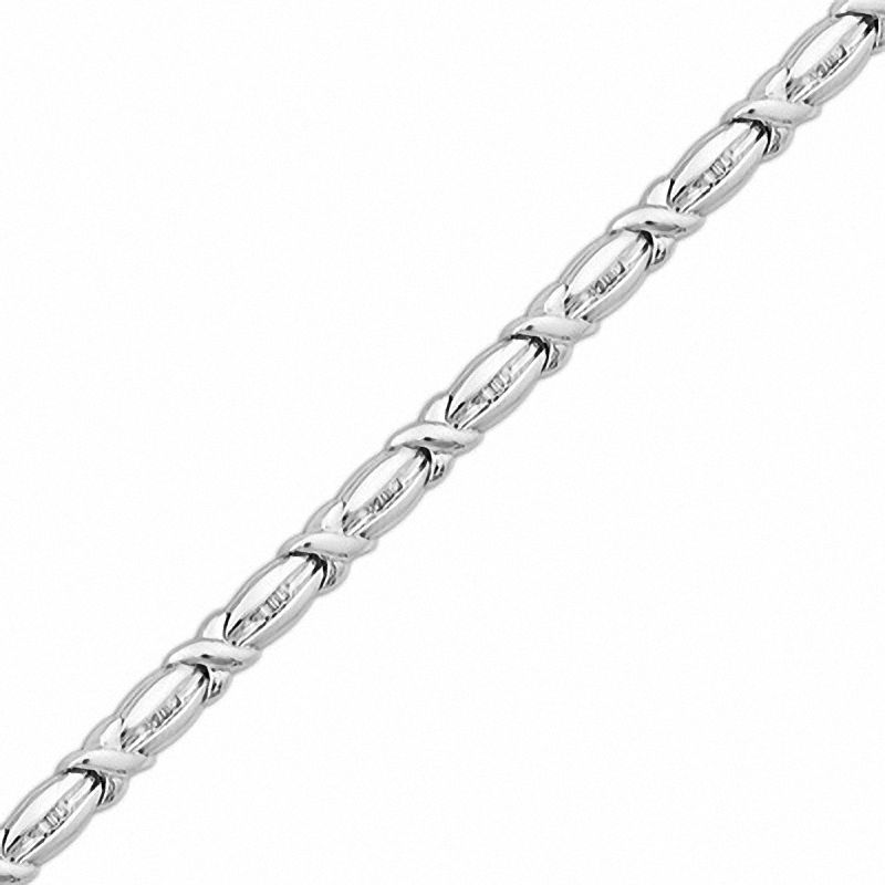 0.25 CT. T.W. Baguette Diamond "X" Style Bracelet in Sterling Silver