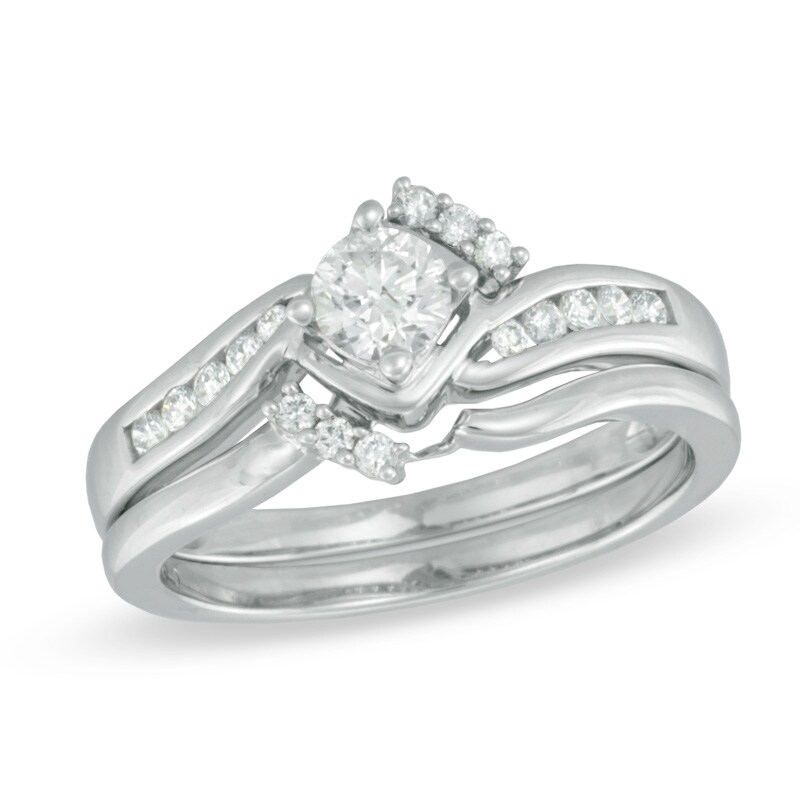 Main Image 1 of 0.50 CT. T.W. Diamond Tilted Bypass Bridal Set in 10K White Gold