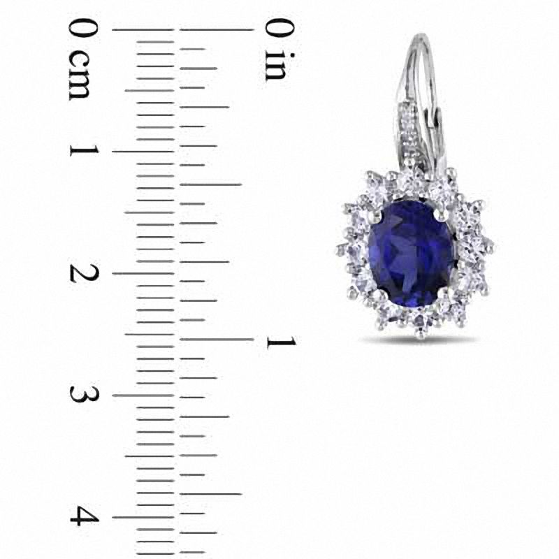 Main Image 2 of Oval Blue and White Lab-Created Sapphire with Diamond Accent Sunburst Frame Earrings in Sterling Silver