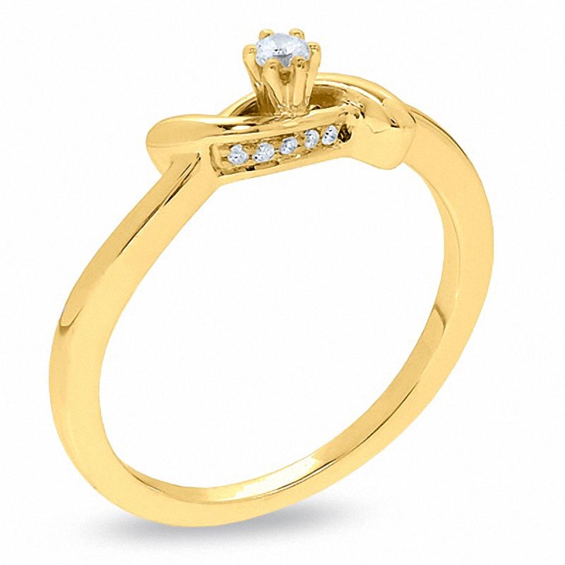 0.16 CT. T.W. Diamond XOX Band in 10K Gold