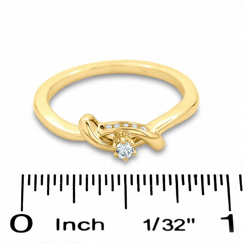 0.16 CT. T.W. Diamond XOX Band in 10K Gold