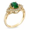 Thumbnail Image 1 of Oval Lab-Created Emerald and White Sapphire Ring in 10K Gold