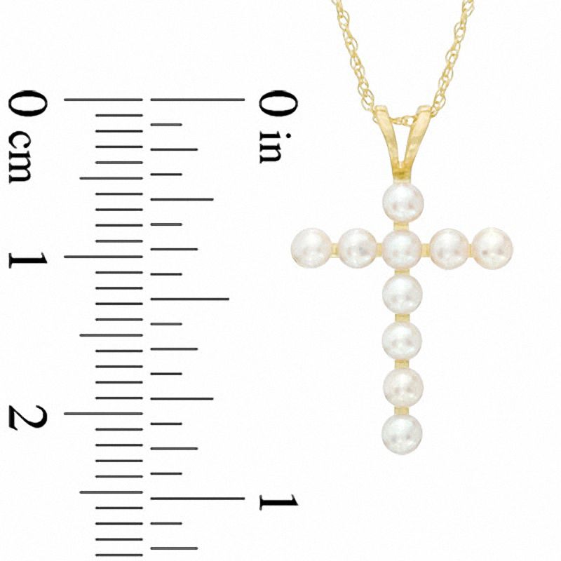 2.5-2.75mm Button Cultured Freshwater Pearl Cross Pendant in 10K Gold