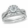 Thumbnail Image 0 of 1.10 CT. T.W. Diamond Frame Twist Shank Bridal Set in 14K White Gold