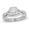 Thumbnail Image 1 of 0.70 CT. T.W. Certified Canadian Diamond Twist Shank Bridal Set in 14K White Gold (I/I1)