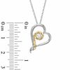 Thumbnail Image 1 of 0.15 CT. Princess-Cut Diamond Solitaire Tilted Heart Pendant in 10K Two-Tone Gold