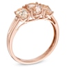 Thumbnail Image 1 of Oval Morganite and Diamond Accent Three Stone Ring in 10K Rose Gold