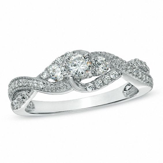 0.58 CT. T.W. Diamond Three Stone Twist Ring in 10K White Gold