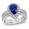 Thumbnail Image 0 of Pear-Shaped Tanzanite and 1.19 CT. T.W. Diamond Three-Piece Bridal Set in 14K White Gold