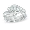 1.15 CT. T.W. Diamond Three Stone Swirl Bridal Set in 14K White Gold