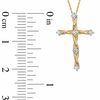 0.12 CT. T.W. Diamond Twine Cross Pendant in 10K Gold