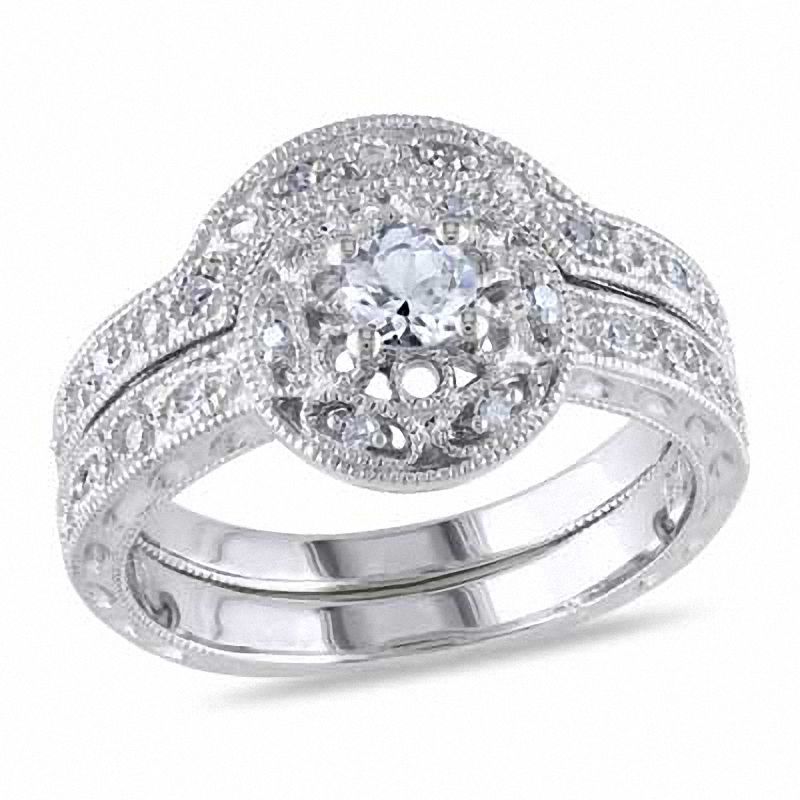 Lab-Created White Sapphire and 0.09 CT. T.W. Diamond Fashion Ring Set in Sterling Silver